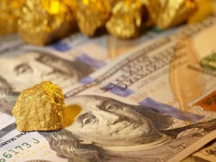 Vàng và USD đồng loạt giảm giá