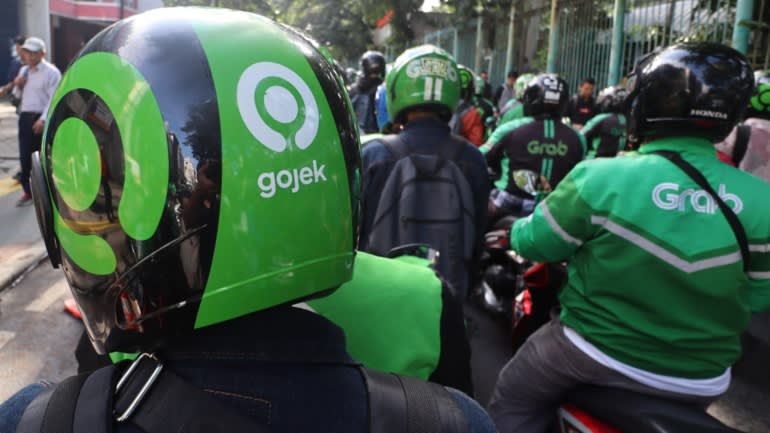 Grab và Gojek từng là đối thủ gay gắt nhưng cuộc đàm phán về việc sáp nhập hiện đang nóng lên