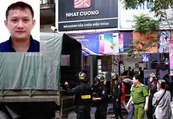 Cơ quan Cảnh sát điều tra Bộ Công an thực hiện khám xét tại một cửa hàng của Cty Nhật Cường. Bùi Quang Huy (ảnh nhỏ góc trên trái) đang bị truy nã quốc tế