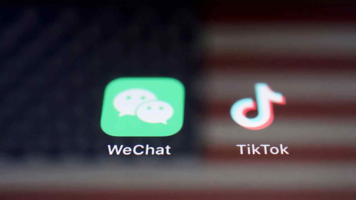 Biểu tượng của WeChat và TikTok: số phận của hai ứng dụng Trung Quốc vẫn chưa chắc chắn. © Reuters