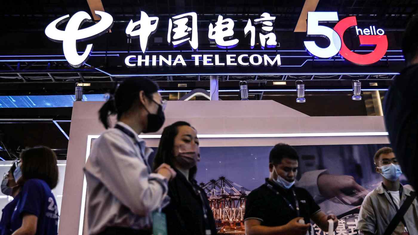 Một gian hàng của China Telecom tại triển lãm Bắc Kinh vào tháng 7 năm 2021. Việc chào bán của hãng viễn thông lớn nhất thế giới sẽ là danh sách lớn nhất của đại lục trong một thập kỷ. © Reuters