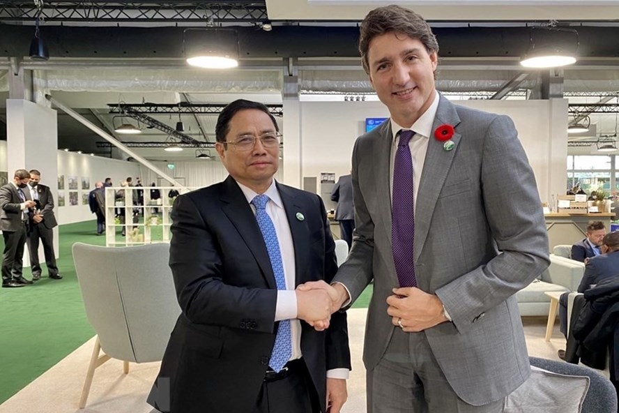 Thủ tướng Phạm Minh Chính gặp Thủ tướng Canada Justin Trudeau. Ảnh: TTXVN