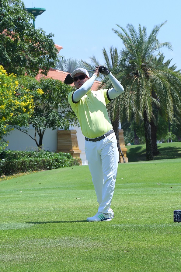 Golfers play on Tan Son Nhat golf course