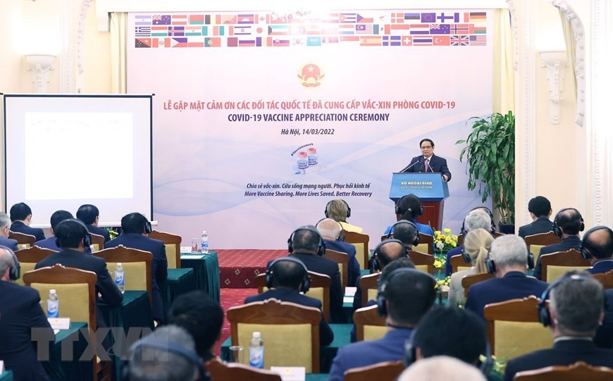 PM Pham Minh Chinh at the meeting to appreciate international support in the COVID-19 fight. (Photo: VNA)