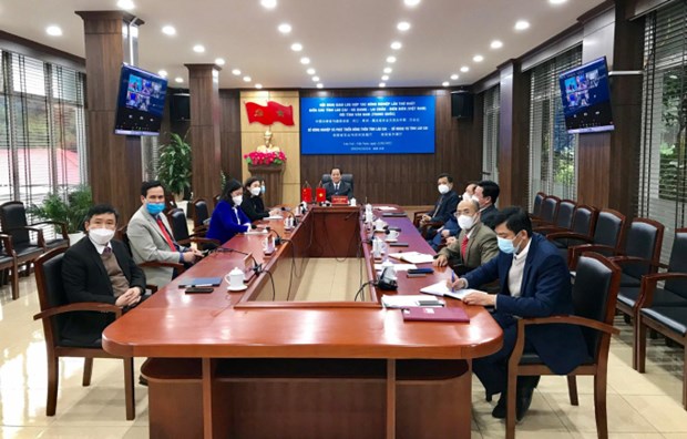 Lao Cai officials attend the meeting via videoconference. (Photo: nongnghiep.vn)