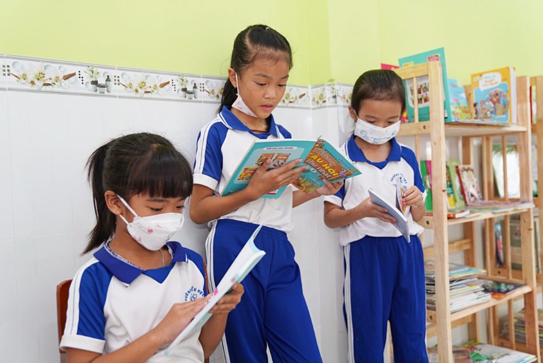 School children are seen reading books donated by BASF and its partners - PHOTOS: COURTESY OF BASF