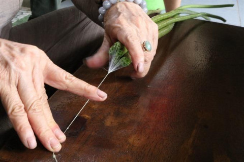 Weaving silk from lotus in Vietnam