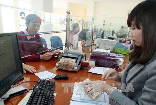 The State Bank of Vietnam set the daily reference exchange rate for the US dollar at 23,160 VND/USD on May 17. (Photo: VNA)