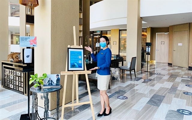 The mobile app Việt Nam Tourism has been introduced at all hotels in the country. —VNS Photo Mạnh Trí