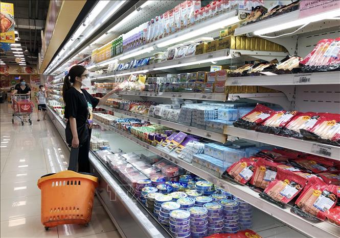 The group of processed foods and frozen foods with a wide variety of products are traded in the market in Ho Chi Minh City. Photo: My Phuong