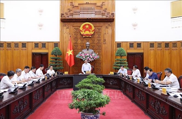 Thủ tướng Phạm Minh Chính chủ trì cuộc họp (Ảnh: TTXVN)