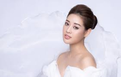 Miss Khanh Van with a new image of a businesswoman