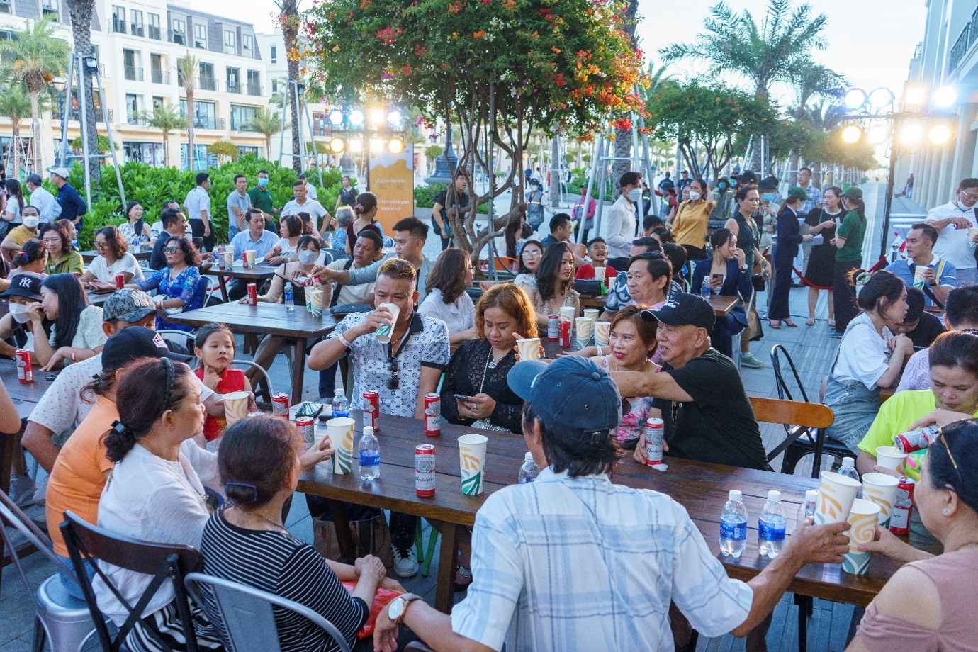 MerryLand Quy Nhon guests enjoy beer, food, and lively music.