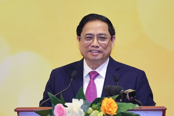 Thủ tướng Phạm Minh Chính nhấn mạnh, một nhiệm vụ quan trọng của ngành ngân hàng là tập trung tháo gỡ khó khăn, thúc đẩy phát triển thị trường bất động sản cả về phía người bán và người mua (Ảnh: VGP/Nhật Bắc)