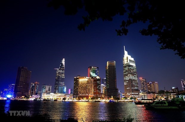 The center of Ho Chi Minh City shimmers by the Saigon River. (Photo: Hong Dat/VNA).