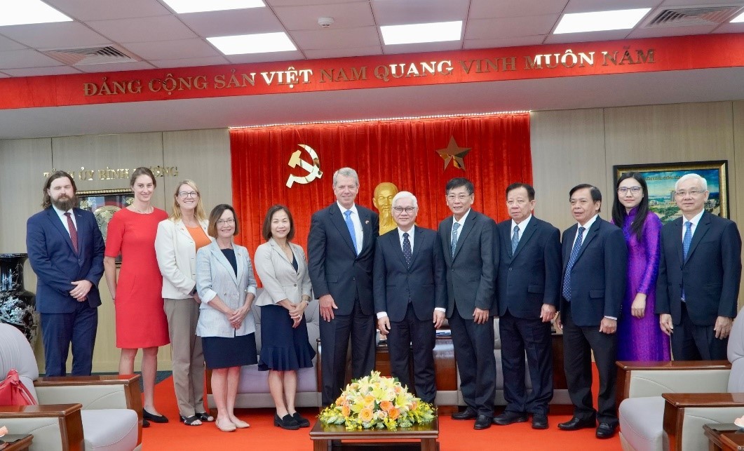 Delegates pose for a photo.