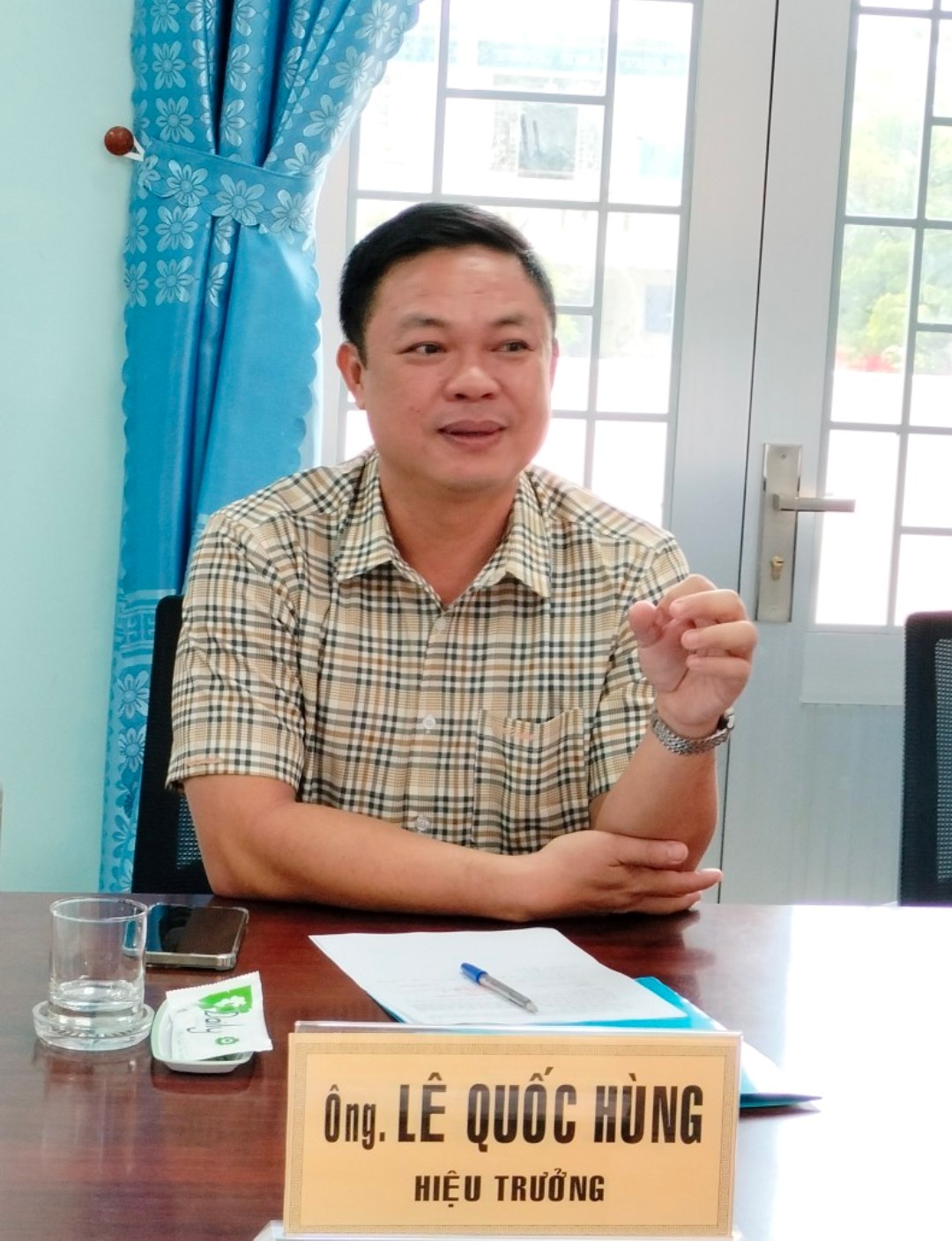 Mr Le Quoc Hung - Rector of Long An College.