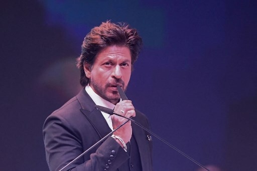 Bollywood actor Shah Rukh Khan speaks during the opening ceremony of the 28th Kolkata International Film Festival in Kolkata. Photo: AFP