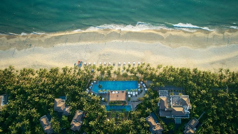 Premier Village Danang Resort is located on My An Beach with a romantic stretch of white sand.