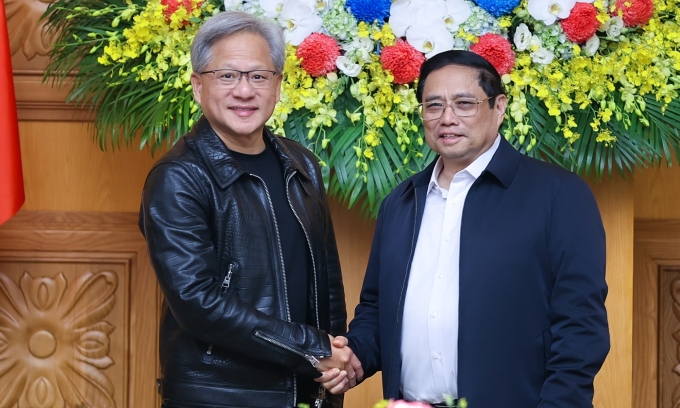 Thủ tướng Phạm Minh Chính (bìa phải) tiếp chủ tịch tập đoàn Nvidia Jensen Huang, chiều 10/12. Ảnh: Nhật Bắc