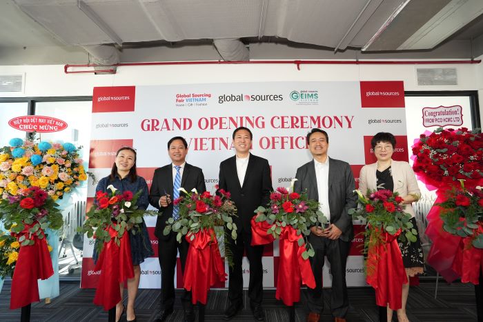 Mr Hu Wei, CEO of Global Sources (centre), at the company's Vietnam office opening