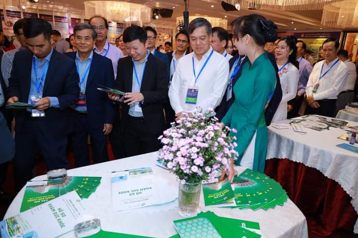 Delegates and guests visit the product display booth