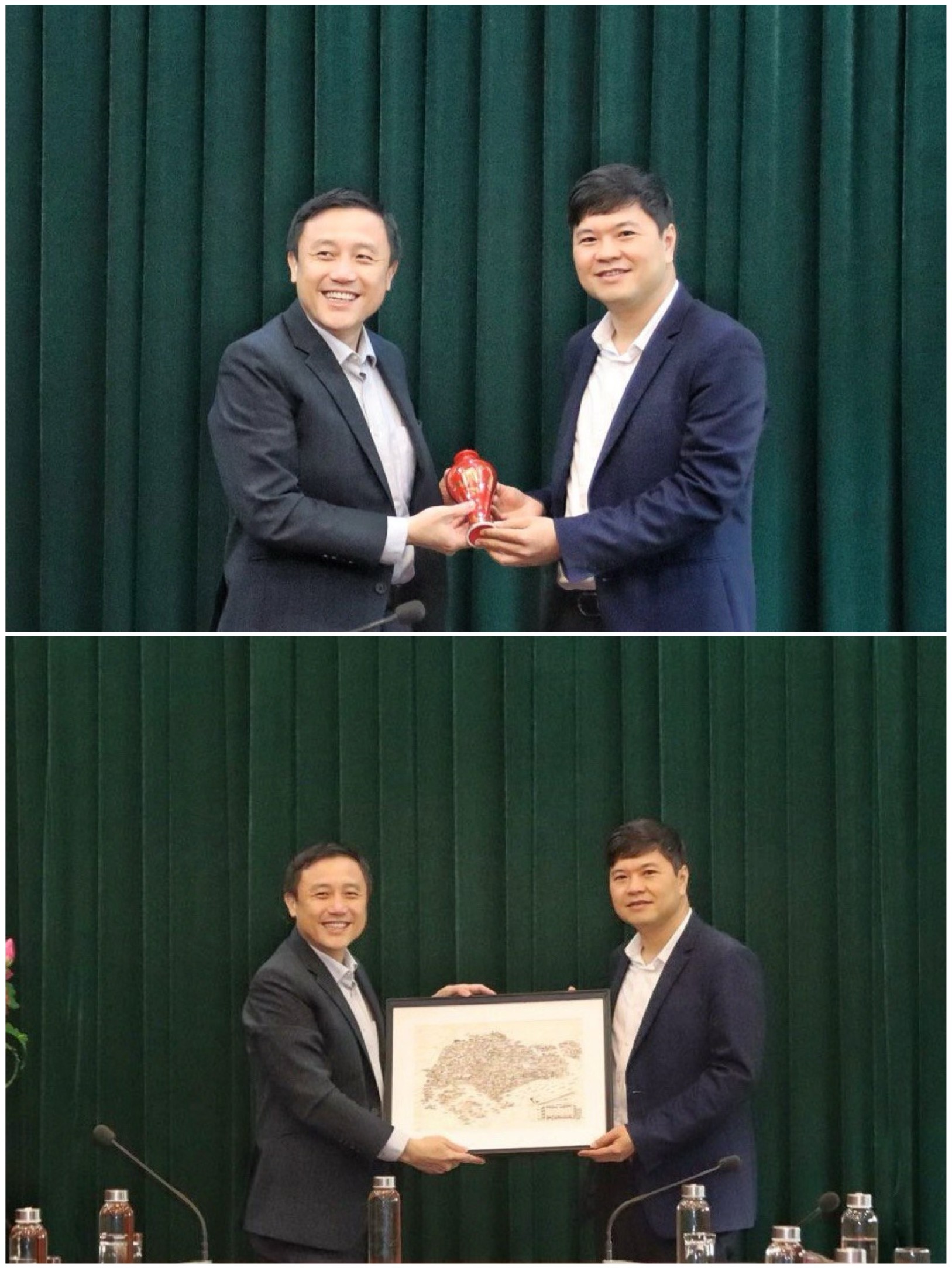 Phó Chủ tịch UBND thành phố Hoàng Minh Cường và Giám đốc điều hành Cơ quan Phát triển doanh nghiệp Singapore, khu vực Đông Nam Á Kow Juan Tiang trao quà lưu niệm.