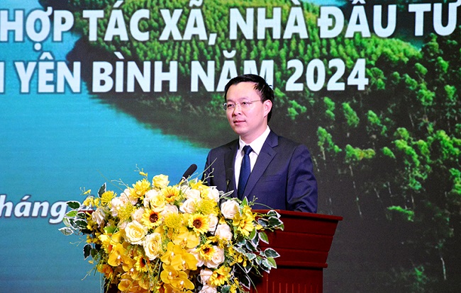Đồng chí An Hoàng Linh - Bí thư Huyện ủy, Chủ tịch HĐND huyện Yên Bình phát biểu tại Hội nghị
