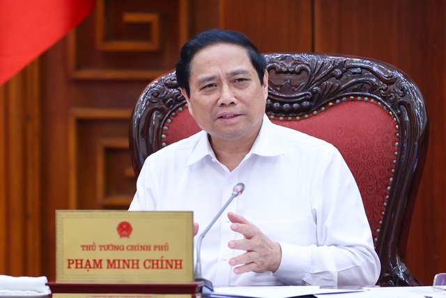 : Thủ tướng Phạm Minh Chính chủ trì cuộc họp tháo gỡ khó khăn, vướng mắc, thúc đẩy phát triển nhà ở xã hội chiều tối ngày 17/5 - Ảnh: TTXVN