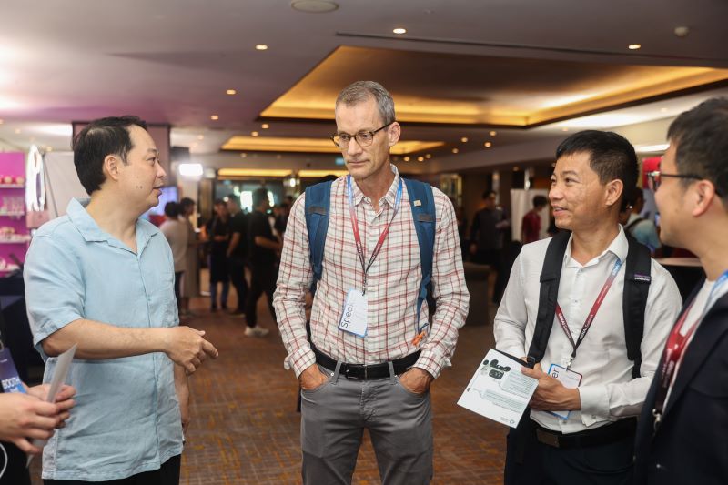 Dr. Jeff Dean engaged with delegates at the conference