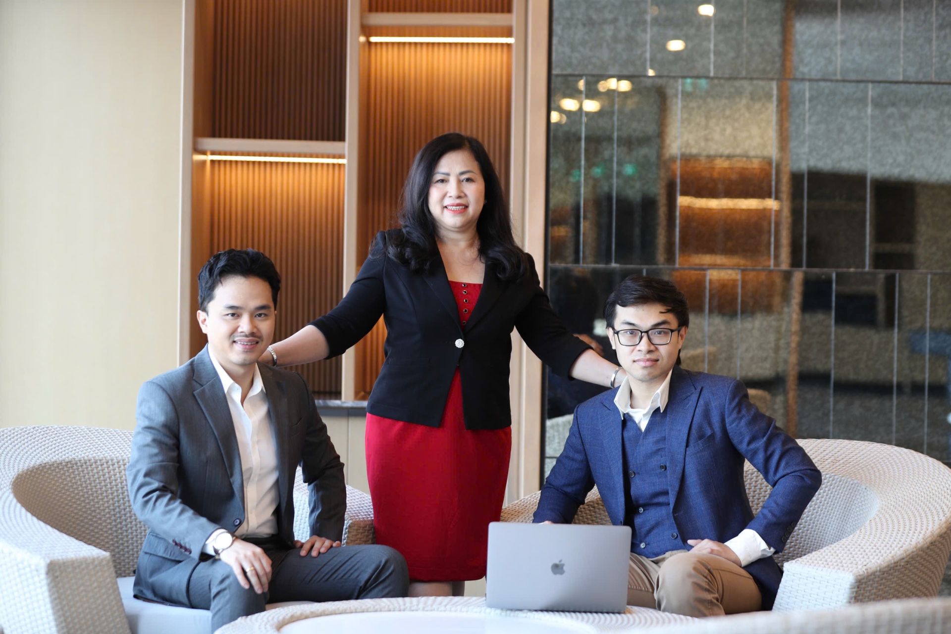 Mrs Nguyen Thi Ngoc Linh - the founder of the Ngoc Linh rice paper brand, along with her two sons, Nguyen Minh Tri and Nguyen Chi Tin