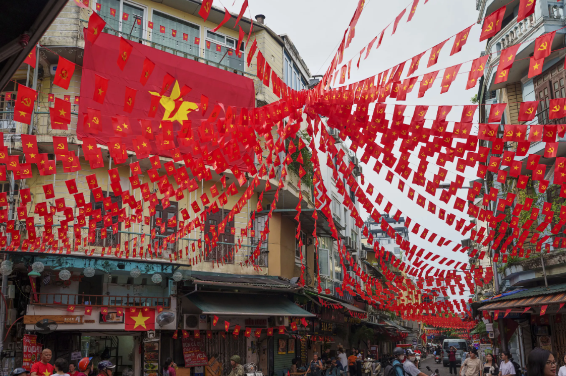 The vibrant red of national and Party flags appeared across Hanoi’s Old Quarter, Vietnam The vibrant red of national and Party flags appeared across Hanoi’s Old Quarter, Vietnam