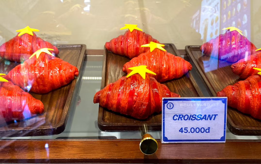 Loaves of banh mi decorated with yellow stars on display at a bakery in Hanoi, Vietnam Loaves of banh mi decorated with yellow stars on display at a bakery in Hanoi, Vietnam